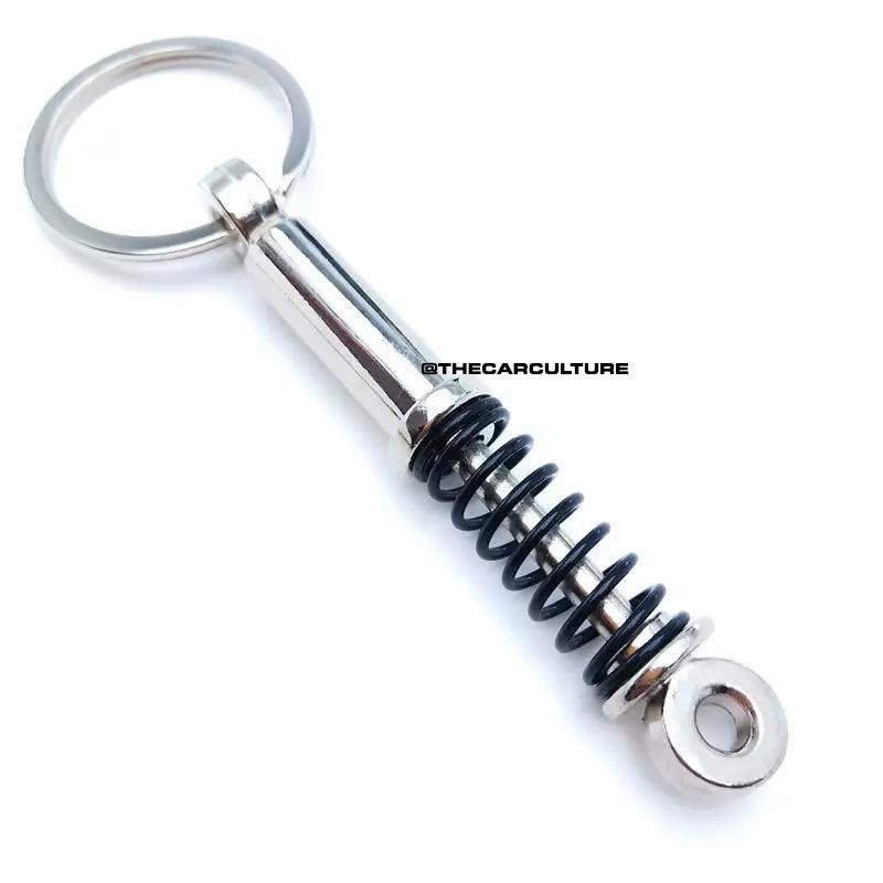 Shock Keychain - The Car Culture